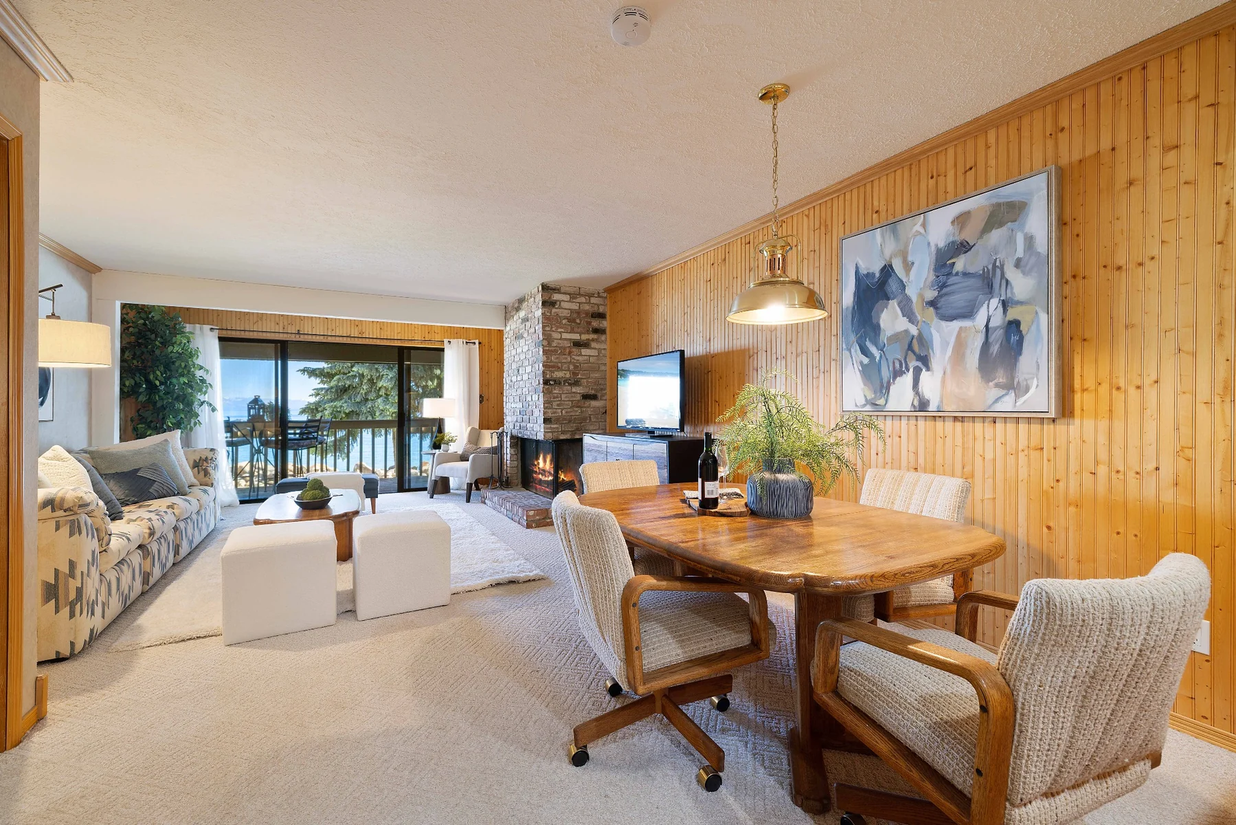 Open living and dining area with lake views